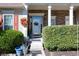 Inviting front entrance with stone columns, seasonal wreaths, and trimmed shrubs at 1770 Valleywood Dr, Avon, IN 46123