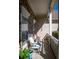 Cozy front porch featuring stone accents, seating, and potted plants at 1770 Valleywood Dr, Avon, IN 46123