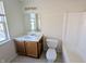 Functional bathroom with vanity, toilet, and shower-tub combination with great lighting at 18904 Planer Dr, Noblesville, IN 46062