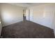 Bedroom featuring neutral walls, carpet, and two closets at 18904 Planer Dr, Noblesville, IN 46062
