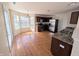Bright kitchen featuring stainless steel appliances, wood cabinets, granite countertops, and ample natural light at 18904 Planer Dr, Noblesville, IN 46062
