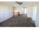 Upstairs living area featuring neutral carpet, bright windows, and access to multiple bedrooms at 18904 Planer Dr, Noblesville, IN 46062