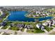 Aerial view of the neighborhood showcasing the beautiful lake and surrounding homes at 1927 Westminster Pl, Columbus, IN 47201