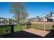 Inviting backyard deck with decorative railing and views of the lake and neighborhood at 1927 Westminster Pl, Columbus, IN 47201