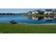 Expansive backyard with a well-manicured lawn extending to the lake's edge with neighborhood views at 1927 Westminster Pl, Columbus, IN 47201