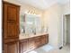 Bathroom featuring double sink vanity with ample storage, and a large mirror for added convenience at 1927 Westminster Pl, Columbus, IN 47201