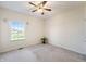 Inviting bedroom with large window providing natural light and peaceful outdoor views at 1927 Westminster Pl, Columbus, IN 47201