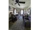 Comfortable living room offers ample seating, natural light, and cozy decor at 2018 Poplar St, Anderson, IN 46012