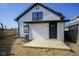 Backyard featuring new deck, white vinyl siding with black trim at 2216 Bethel Ave, Indianapolis, IN 46203