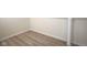 Unfinished basement featuring laminate flooring and a white pipe at 2216 Bethel Ave, Indianapolis, IN 46203