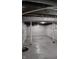 Spacious basement featuring painted walls and ceiling, with support beams at 2216 Bethel Ave, Indianapolis, IN 46203