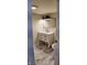 Updated bathroom featuring a white vanity with marble floors and black hardware at 2216 Bethel Ave, Indianapolis, IN 46203