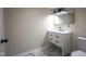 Bathroom featuring a modern vanity with marble flooring and a stylish lighting fixture at 2216 Bethel Ave, Indianapolis, IN 46203
