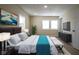 Comfortable bedroom with modern decor, neutral tones, and ample natural light at 2216 Bethel Ave, Indianapolis, IN 46203