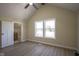 Bedroom featuring a vaulted ceiling, ceiling fan, and large windows offering abundant natural light at 2216 Bethel Ave, Indianapolis, IN 46203