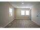 Bright bedroom features new paint, new trim and vinyl plank flooring at 2216 Bethel Ave, Indianapolis, IN 46203