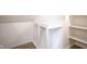 View of a closet with a bench and shelves at 2216 Bethel Ave, Indianapolis, IN 46203