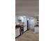 Modern kitchen with white cabinets, stainless steel appliances, and butcher block countertops at 2216 Bethel Ave, Indianapolis, IN 46203