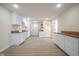 Spacious kitchen featuring white cabinetry, butcher block counters, and hardwood flooring at 2216 Bethel Ave, Indianapolis, IN 46203