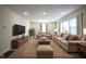 Spacious living room with neutral color palette, plush sofas, and recessed lighting at 2216 Bethel Ave, Indianapolis, IN 46203