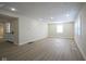 A large living area with hardwood flooring and recessed lighting throughout at 2216 Bethel Ave, Indianapolis, IN 46203