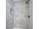 Modern tiled shower featuring gray tiling and a built-in niche at 2216 Bethel Ave, Indianapolis, IN 46203