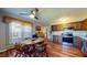 Cozy eat-in kitchen featuring wood cabinets, stainless steel appliances and a ceiling fan at 2455 Lenvoil Rd, Martinsville, IN 46151