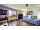 Inviting living room featuring a fireplace and large window with natural light at 2455 Lenvoil Rd, Martinsville, IN 46151