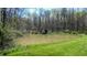 A serene pond surrounded by lush greenery creating a peaceful atmosphere at 2455 Lenvoil Rd, Martinsville, IN 46151