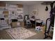 Versatile basement space with shelving, a work area, and gym equipment at 2599 Liatris Dr, Plainfield, IN 46168