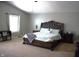 Primary bedroom featuring a vaulted ceiling and a large bed with a decorative headboard at 2599 Liatris Dr, Plainfield, IN 46168