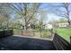 Large wood deck overlooking a spacious backyard, perfect for entertaining and relaxation at 30 Sleepy Hollow Ct, Westfield, IN 46074