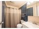 Bathroom featuring tile surround shower and updated vanity at 30 Sleepy Hollow Ct, Westfield, IN 46074