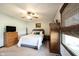 Cozy bedroom with neutral carpet, ceiling fan, and ample natural light from the window at 30 Sleepy Hollow Ct, Westfield, IN 46074