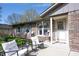 Attractive single-story brick home with a welcoming front porch and manicured landscaping at 30 Sleepy Hollow Ct, Westfield, IN 46074