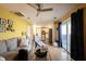 Bright living room features hardwood floors and sliding glass doors to back deck at 30 Sleepy Hollow Ct, Westfield, IN 46074