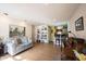 Spacious open-concept living room leading into the eat-in kitchen with modern flooring at 30 Sleepy Hollow Ct, Westfield, IN 46074