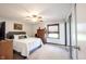 Bright bedroom features a ceiling fan, closet, and neutral decor at 30 Sleepy Hollow Ct, Westfield, IN 46074