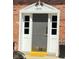 Charming home entrance featuring a decorative door frame and sidelights at 3010 Lake Shore Dr # D, Indianapolis, IN 46205