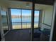 Balcony overlooking a scenic lake view, complete with outdoor seating at 3010 Lake Shore Dr # D, Indianapolis, IN 46205