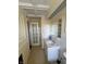Bathroom features a single sink vanity, mirror, and a tiled backsplash at 3010 Lake Shore Dr # D, Indianapolis, IN 46205