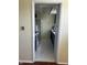 Galley kitchen with appliances, tile flooring, and ample cabinet space at 3010 Lake Shore Dr # D, Indianapolis, IN 46205