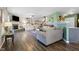 Spacious living room with hardwood floors, stylish furniture, and a cozy atmosphere at 3038 Arrowroot Ln, Indianapolis, IN 46239