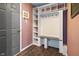 Mud room with cubbies, hooks, and storage space by entrance at 3038 Arrowroot Ln, Indianapolis, IN 46239