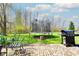 Cozy outdoor patio with brick pavers, seating, and a grill, perfect for entertaining at 3038 Arrowroot Ln, Indianapolis, IN 46239
