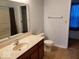 The bathroom features a cultured marble vanity and plenty of space for storage, ensuring style and function at 3097 Limber Pine Dr, Whiteland, IN 46184