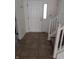 Bright foyer with tile flooring and stairs, creating an inviting entrance to the home at 3097 Limber Pine Dr, Whiteland, IN 46184