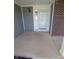Wide front porch featuring gray siding and brick accents, offering a welcoming entrance at 3097 Limber Pine Dr, Whiteland, IN 46184