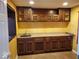 A well-lit kitchenette with lots of cabinet space and good countertop area for efficient meal prep and easy cleanup at 3097 Limber Pine Dr, Whiteland, IN 46184