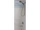 Shower head with adjustable settings and a tiled shower surround at 3097 Limber Pine Dr, Whiteland, IN 46184